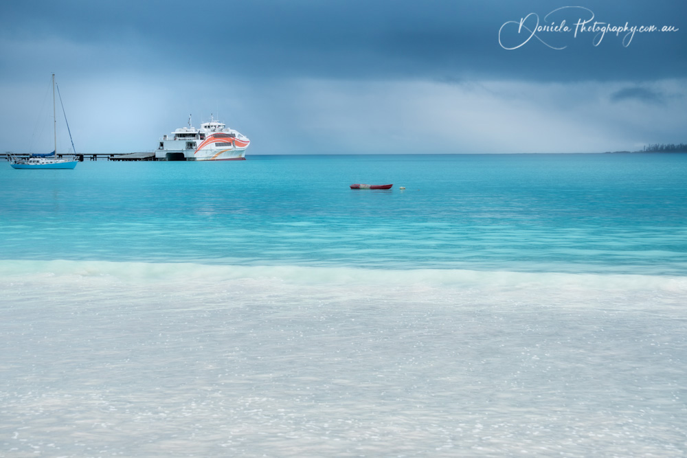 Beautiful light at the horizon on a rainy day at Kuto Bay